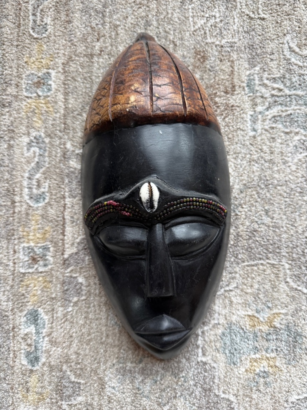 Carved Wooden Mask Wall Art in Black and Brown